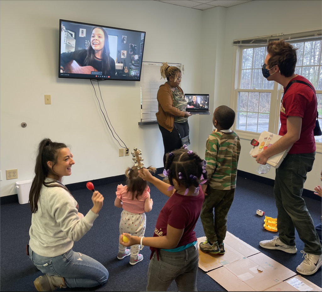 A group of kids dancing and experiencing music therapy